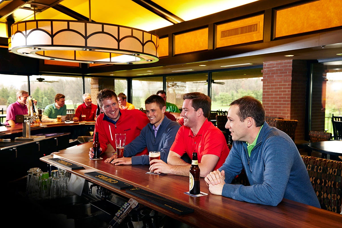 Firestone members congregating at 55th Hole bar